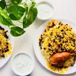 کشمش پلو با ران مرغ